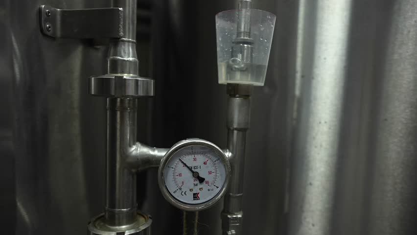 Craft Beer Brewing at a Private Brewery Showing Tools and Processes Used for Unfiltered Beer