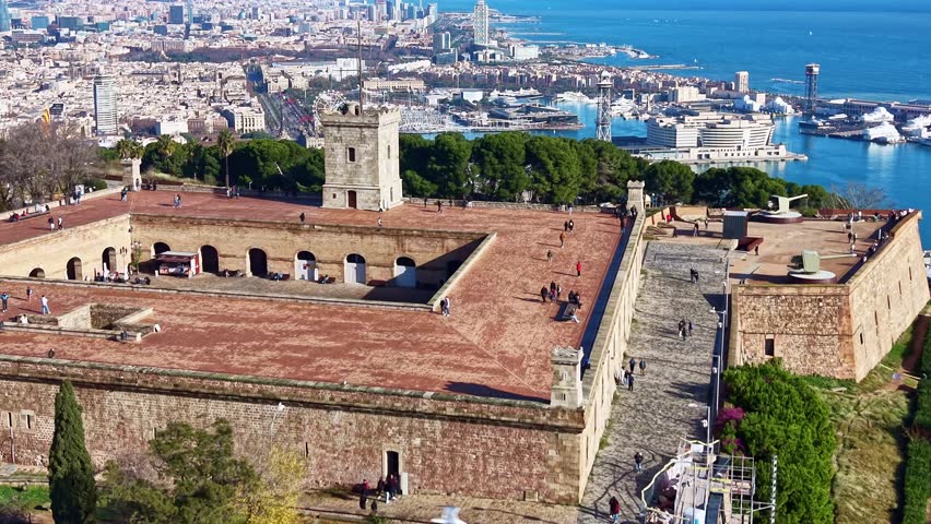 Panning drone fly near the Montjuic Castle which old military fortress built on top of the Montjuic hill, Barcelona, Catalonia, Spain