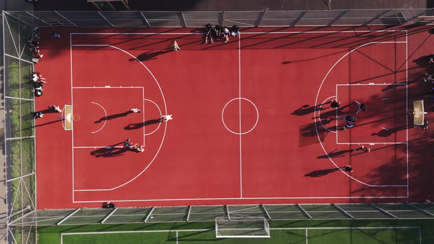Top View of Urban Basketball Court With Players