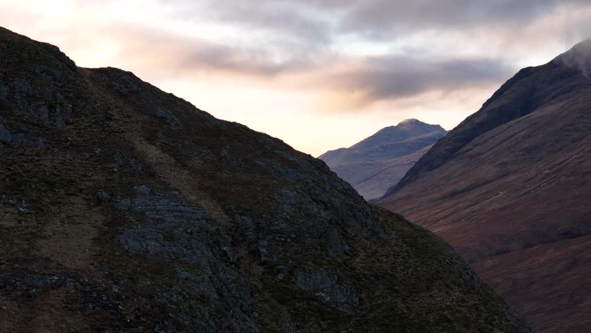 Stunning drone footage of Glencoe in the Scottish Highlands, showcasing Buachaille Etive Mor and Meall a