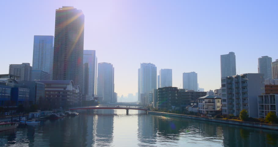 Towering apartment buildings and urban landscape on a clear day on the waterfront