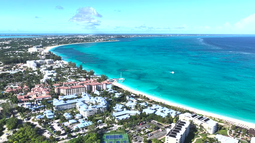 Grace Bay Beach At Turks And Caicos In Overseas Territory England. Seascape Skyline. Downtown Landscape. Summer Travel. Grace Bay Beach In Turks And Caicos England. Highrise Buildings.