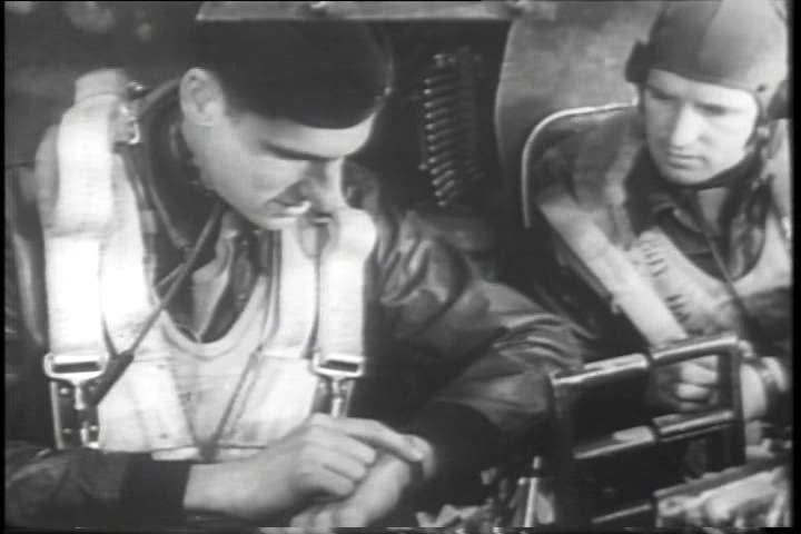 1940s - American men prepare for a bombing mission over Germany in World War two.