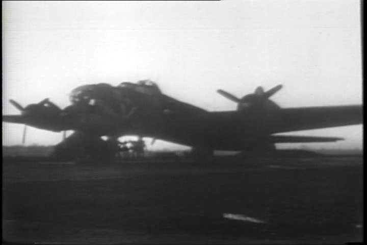 1940s - American men prepare for a bombing mission over Germany in World War two.