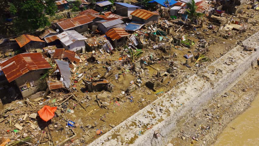 Flood ruined homes along Mananga River after typhoon in Cebu Philippines