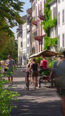 sunny basel city riverside pedestrian crowded walking street 4k vertical timelapse switzerland
