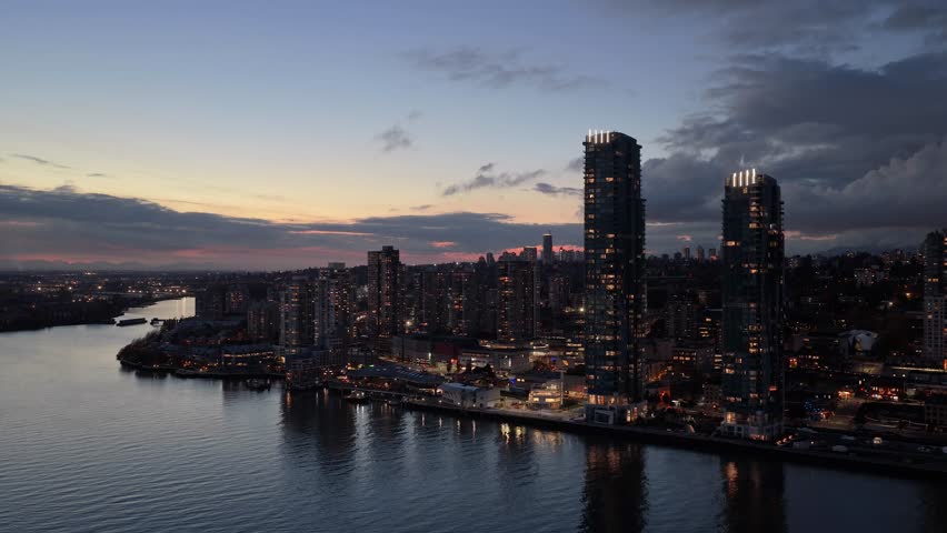 New Westminster City Skyline at Dusk: Aerial View of Modern Architecture and River Reflections in British Columbia, Canada