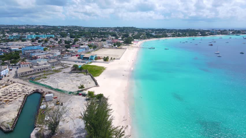 Brownes Beach aerial view at Carlisle Bay in city of Bridgetown, Saint Michael, Barbados. This coast belongs to Bridgetown and Garrison UNESCO World Heritage Site. 