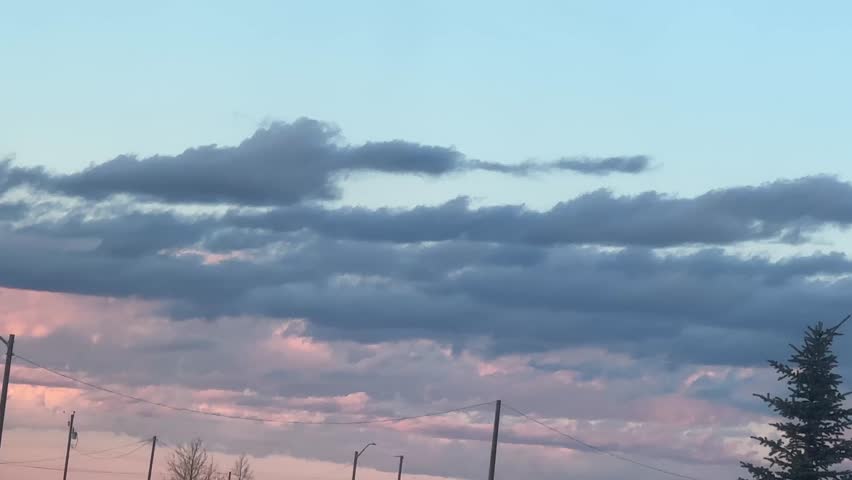 Peaceful Sunset Sky Video Over Rural Landscape With Soft Clouds and Evening Light