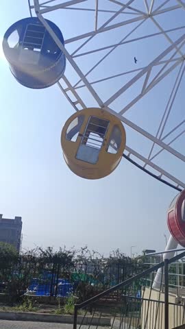 Ferries wheel swing in a park 