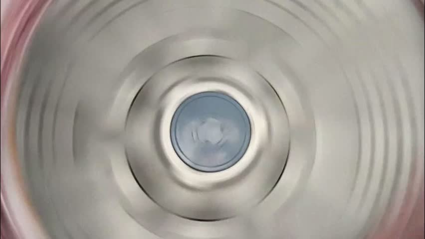 Pulsator is spinning in the washing machine, indoor Chiangmai Thailand.
