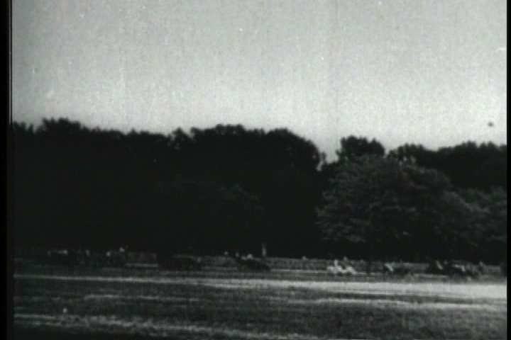 1900s - Early film footage of the Wright Brothers plane at Kitty Hawk and people who knew the Wrights are interviewed.