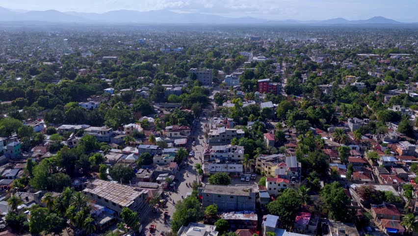 Aerial perspective of the urban layout and mountains in Juana Mendez, Haiti