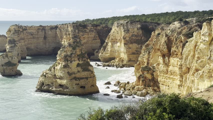 Landscape with beautiful Praia da Marinha, one of the most famous beaches of Portugal, located on the Atlantic coast in Lagoa, Algarve.