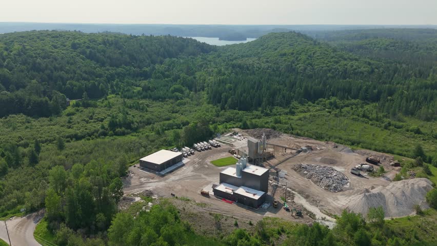 Industrial Concrete Plant , Forest And Lake Landscape In Muskoka, Ontario, Canada.