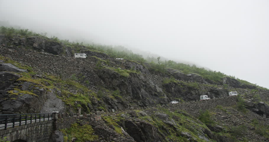 Camper vans driving on the trollstigen mountain road in norway