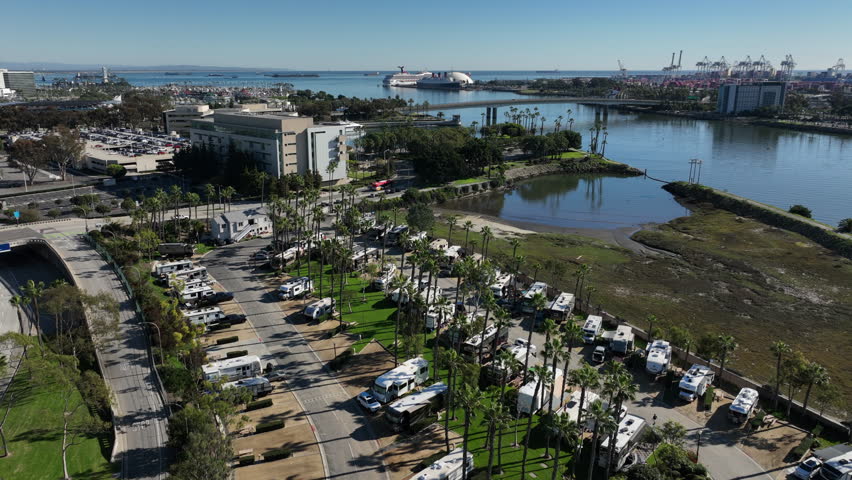 Downtown Long Beach, California, USA - Aerial View of Los Angeles River Where it Ends in the Pacific Ocean Next to the Shoreline and the Queen Mary Ship
