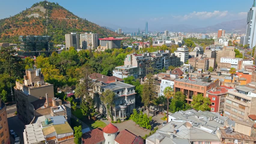 Aerial Fly Santiago de Chile City in Summer at Barrio Lastarria and San Cristobal Hill