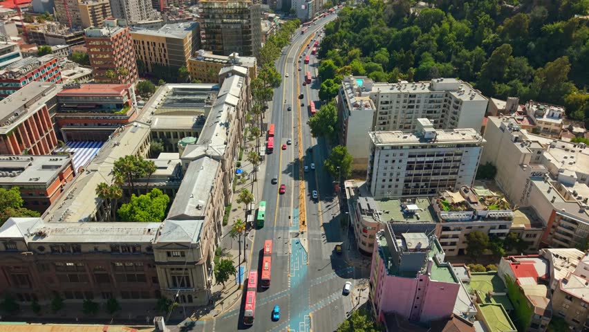 Santiago de Chile Aerial cityscape with Alameda Avenue traffic, urban green park