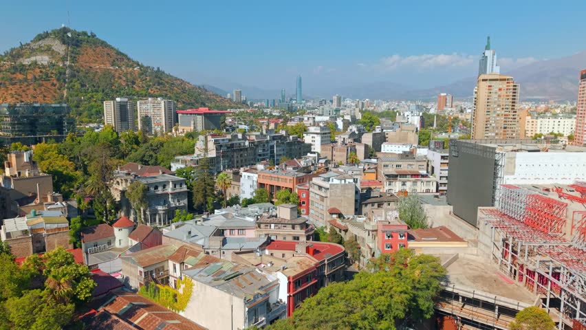 Drone Fly Santiago de Chile City at Lastarria neighborhood, San Cristobal Hill landscape
