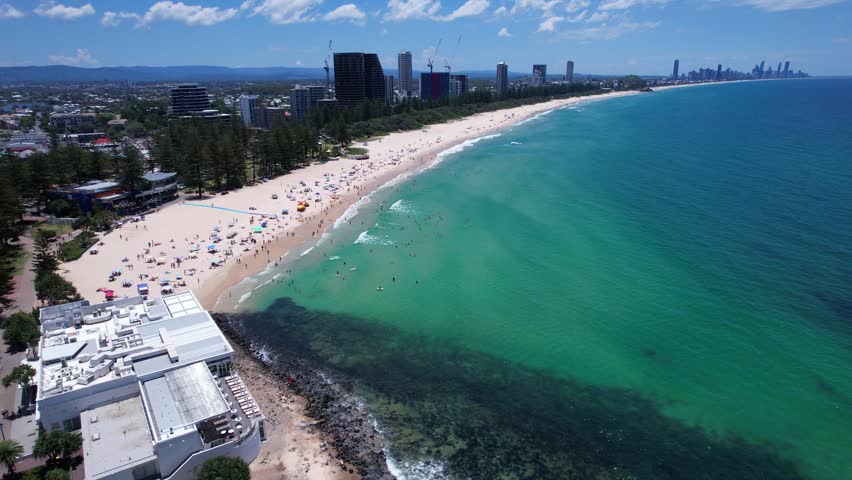 Crowd Of People At Burleigh Beach During Summer In Queensland, Australia - Drone Shot