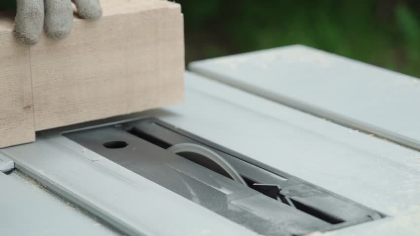 Table Saw Routing - Milling a Piece of Wood - Close Up Carpenter Hands