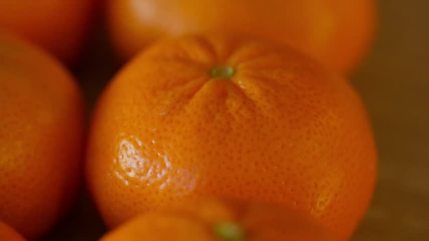 macro close-up of citrus, small mandarin oranges
