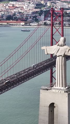Christ The King At Lisbon In Lisbon District Portugal. King Christ Statue. 25 Of April Bridge. Christ The King At Lisbon In Portugal. Tejo River Coast. Landmark Church. Portugal Skyline.