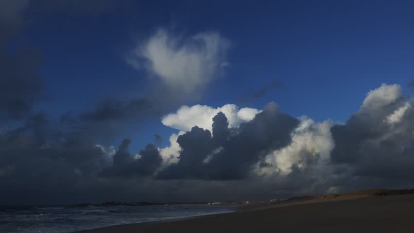 Timelapse of clouds on the beach. Formation of a storm.