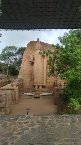 Ancient Aukana Buddha Statue in Sri Lanka, Standing Rock Carved Buddha at Historic Buddhist Site