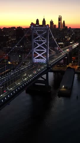 Sunset In Cable Bridge At Philadelphia In Pennsylvania United States. Illuminated Downtown. Sunset City Landscape. Philadelphia At Pennsylvania United States. Ben Franklin Bridge.