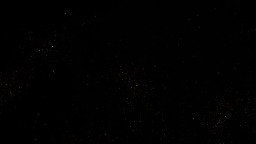 Super Slow Motion Shot of Golden Glitters on Black Background at 1000fps.