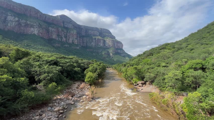 Blyde River flows downstream in Blyde River Canyon in South Africa