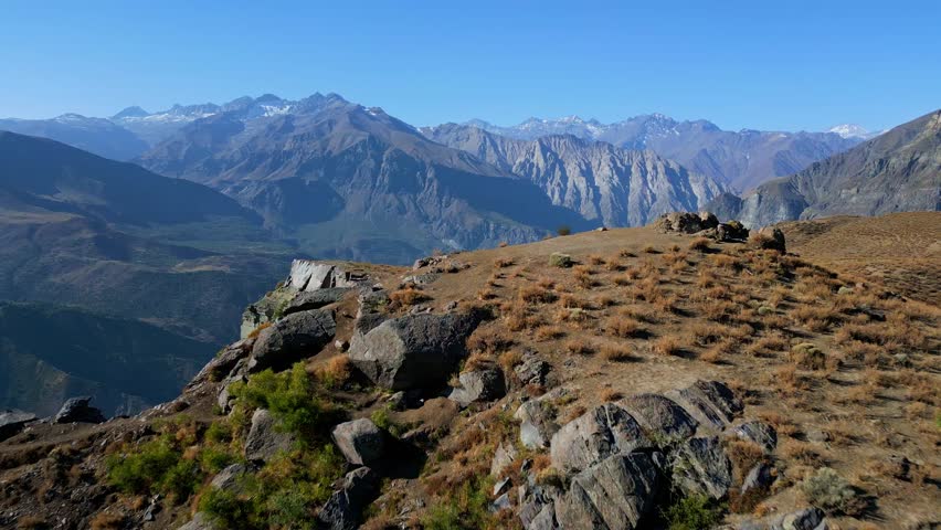 Forward reveal of alpine slope with mountain range. Mirador de los Condores, Santiago, Chile