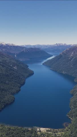 Aerial view of the northern section of Lake Traful surrounded by mountains and forest in Patagonia Argentina