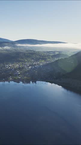 Aerial view of the city of San Martín de los Andes nestled between Lake Lacar and surrounding Patagonian mountains