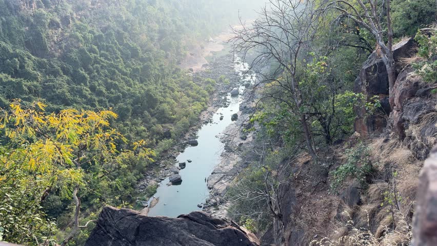 Capture river flow through valley. Beautiful nature scene, tranquil, peaceful, and scenic