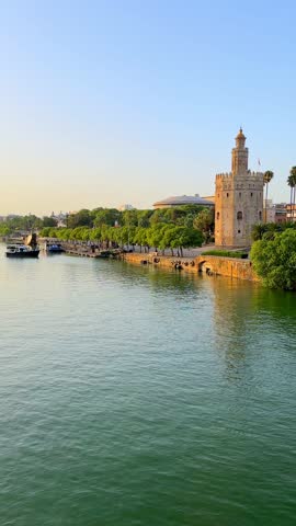 Scenic view of the Torre del Oro historical landmark on the bank of the Guadalquivir in Spain