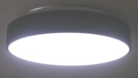 Slow motion capture of flat led ceiling light turning of and on again - Powered by Shutterstock - Get 15% off with code: PIKWIZARD15