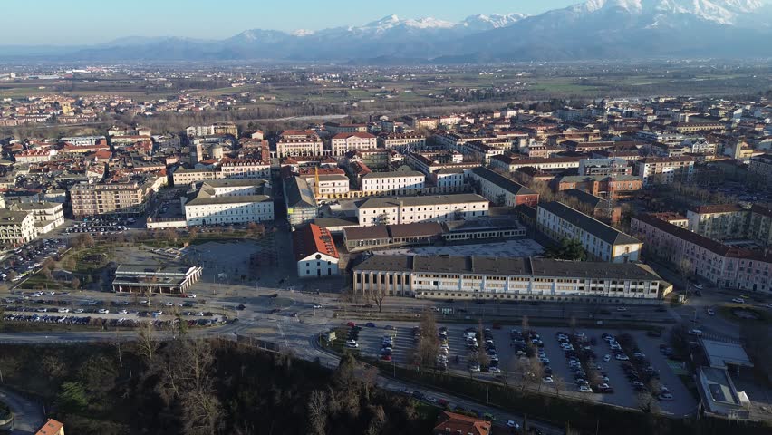 A city with mountains in the background.