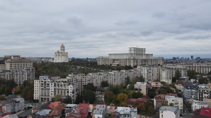 Aerial drone shot moving towards the Palace of the Parliament, also called the People