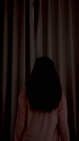 Beautiful Woman Opening Curtains to Welcome New Day. Young Lady Looking Out Window In Morning Light. Calm Adult Female Starting Daily Routine at Home. One Unrecognizable Person Wake up at Morning 4k