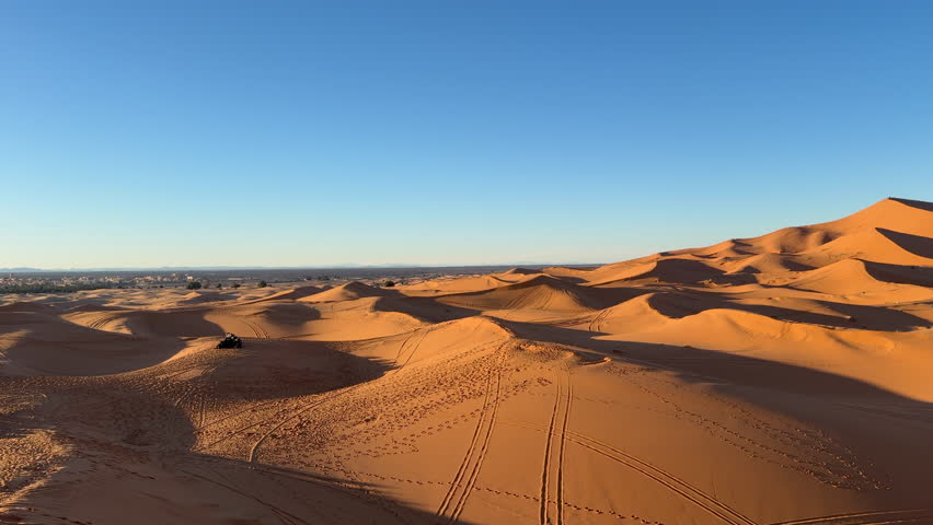 Sunlit Sahara Desert Sand Dunes at Erg Chebbi, Merzouga, Morocco