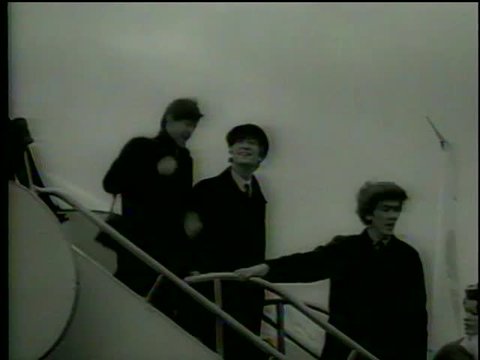 English rock'n'roll band the Beatles arrives in the USA for the first time, John F. Kennedy Airport, New York, February, 10, 1964-MGM PICTURES, UNIVERSAL-INTERNATIONAL NEWSREEL, USA, filmed in 1964  