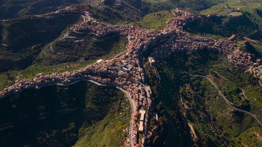 Centuripe Sicily aerial view of lush hilltop mountain town commune revealing Enna province of Italy