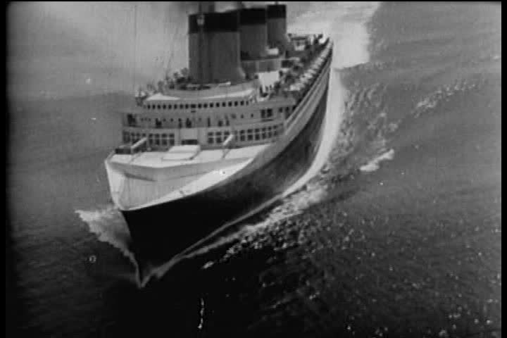 1940s - A fire destroys the SS Normandie at the New York Passenger Ship Terminal in 1942.