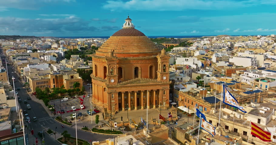 Aerial view of Mosta Church, famous remarkable wartime miracle, architectural landmarks, Malta 
