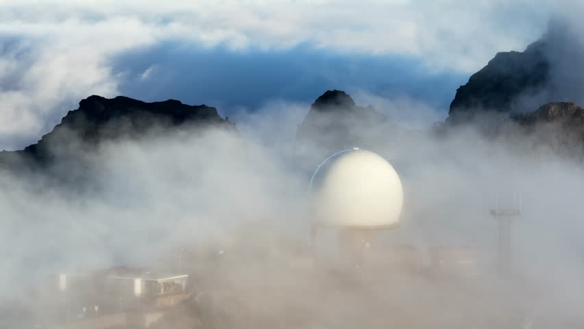 Mountain radar station in Madeira Portugal shrouded by clouds