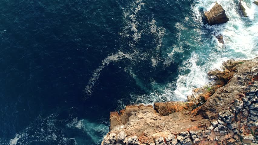 Stunning Sea waves crashes on the rocks