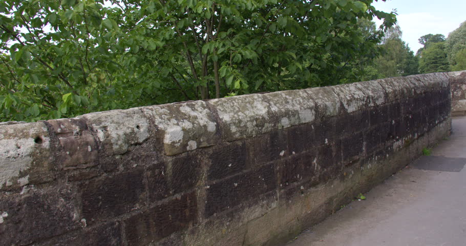 Wide panning shot looking across devils bridge at Kirkby Lonsdale, North Yorkshire
